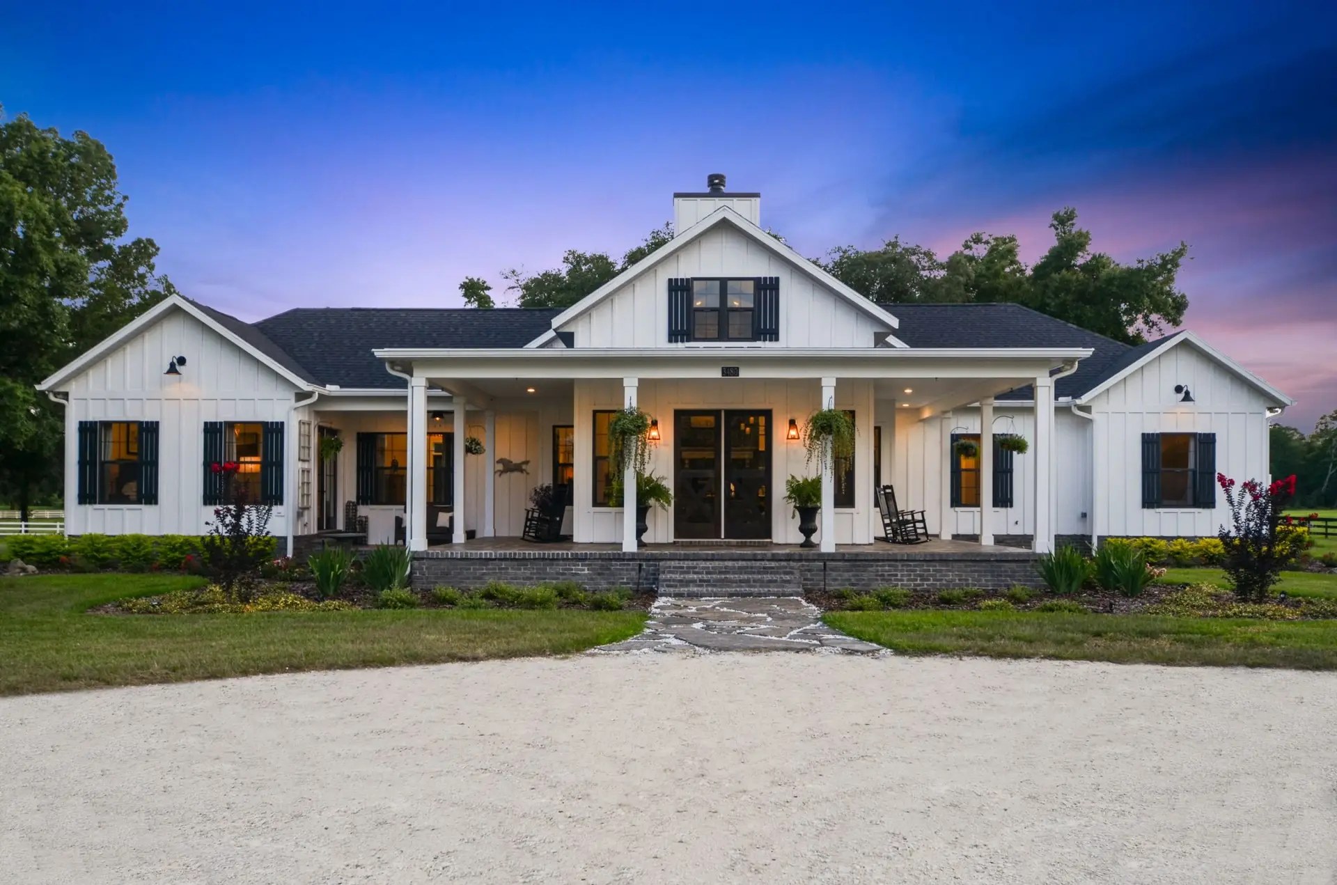 White custom home at dusk