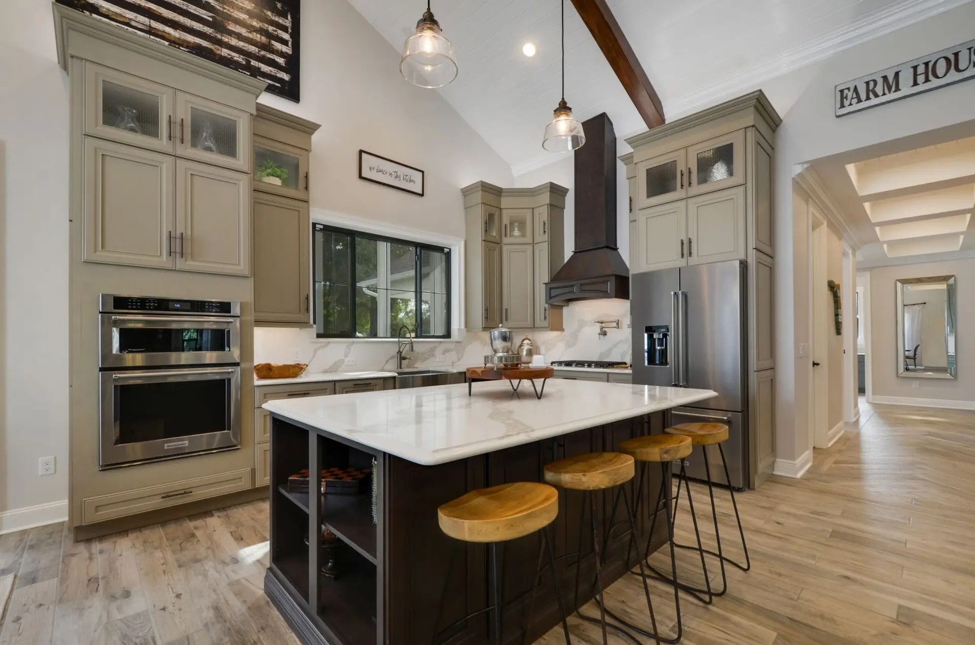 Custom kitchen with a large island and tall cabinetry