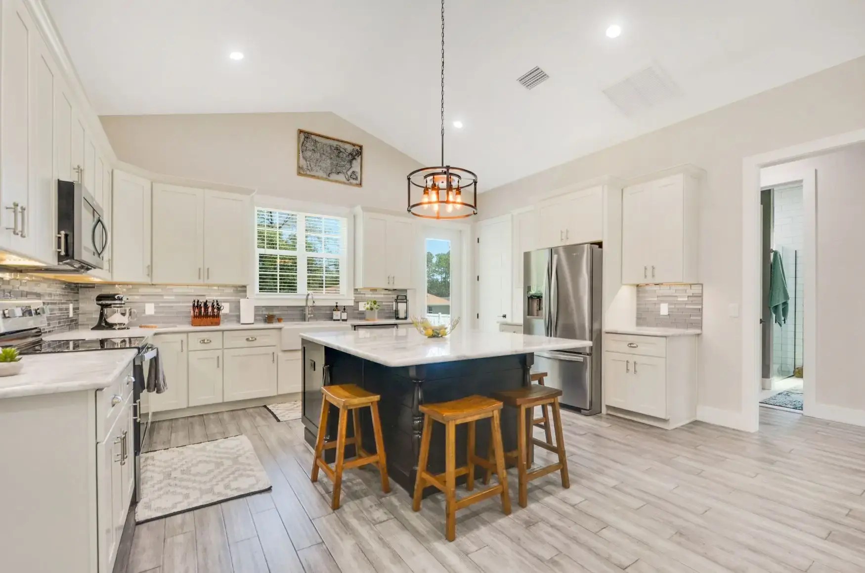 Bright finished kitchen with island seating